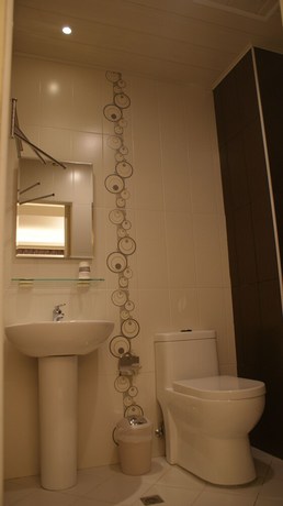 Imagen de la habitación del Hotel Bai Ji Yi. Foto 18