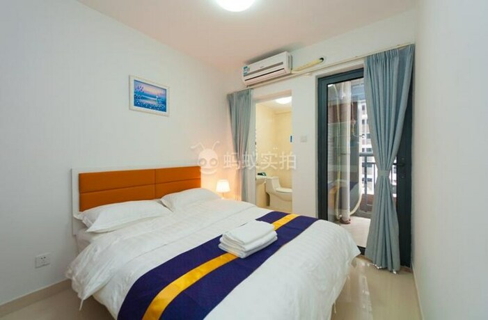 Imagen de la habitación del Hotel Bai Li Deng Apartment. Foto 11
