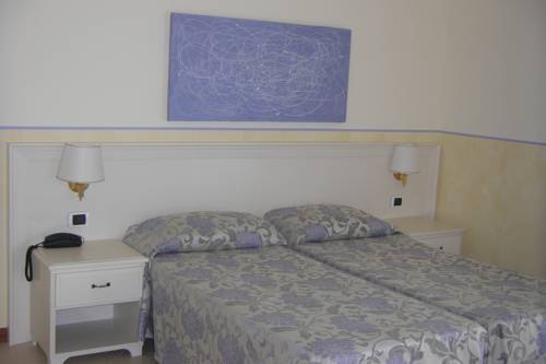 Imagen de la habitación del Hotel Baia Bianca. Foto 10