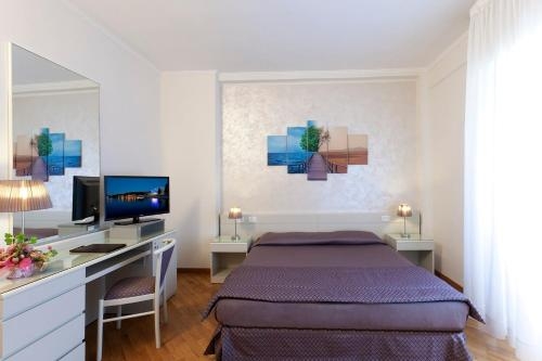 Imagen de la habitación del Hotel Baia D'argento. Foto 10