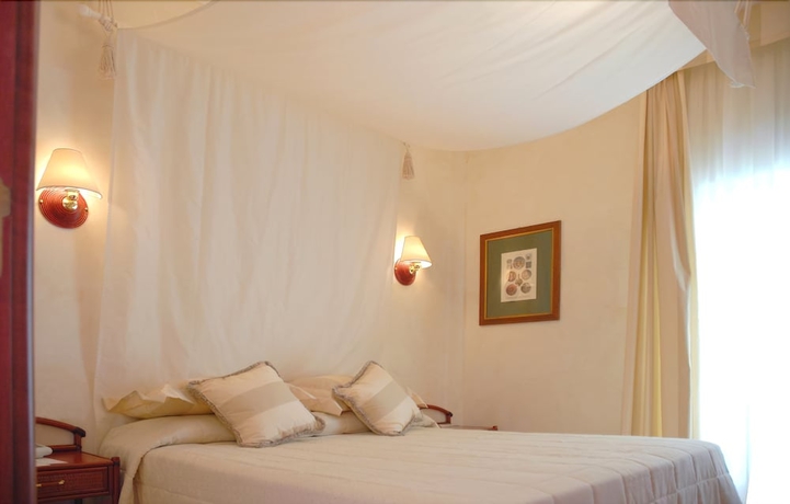 Imagen de la habitación del Hotel Baia Dei Faraglioni. Foto 7