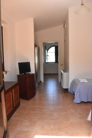 Imagen de la habitación del Hotel Baia Della Rocchetta. Foto 23