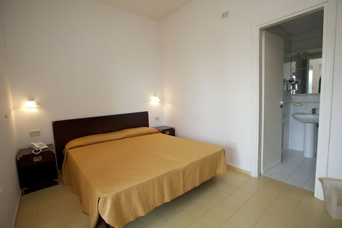 Imagen de la habitación del Hotel Baia Della Rocchetta. Foto 24