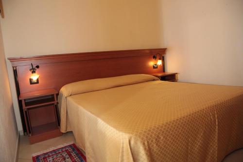 Imagen de la habitación del Hotel Baia Delle Sirene Beach Resort. Foto 8