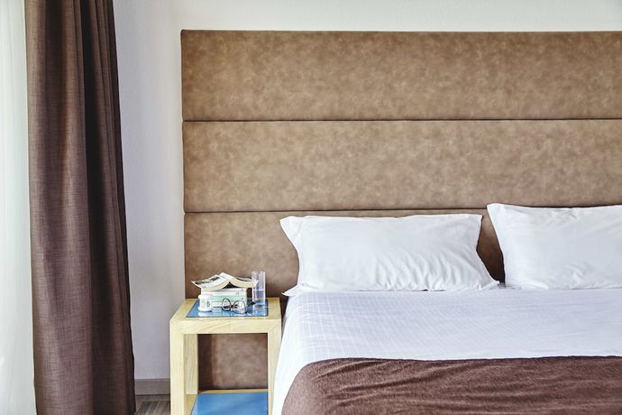 Imagen de la habitación del Hotel Baia Di Conte. Foto 8