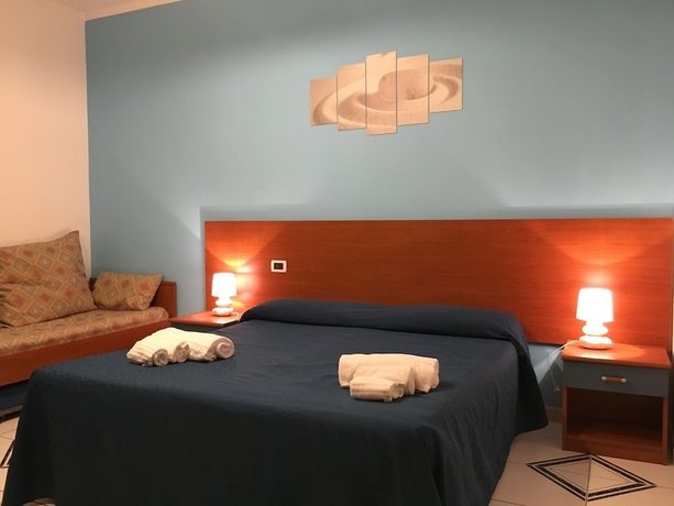 Imagen de la habitación del Hotel Baia Di Naxos. Foto 10
