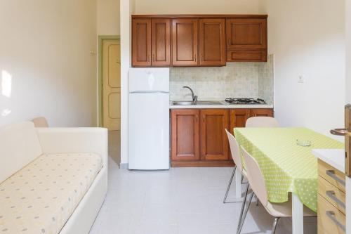 Imagen de la habitación del Hotel Baia Marticana Residence. Foto 4