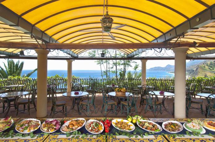 Imagen del bar/restaurante del Hotel Baia Taormina - CDSHotels. Foto 7