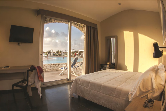 Imagen de la habitación del Hotel Baia dei Mulini Resort and Spa. Foto 7