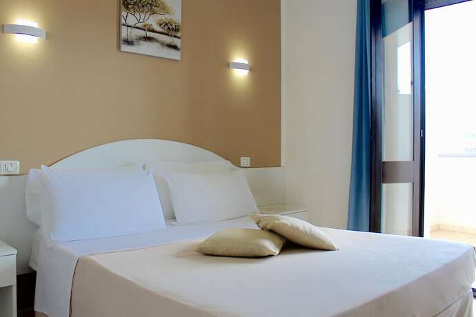 Imagen de la habitación del Hotel Baia del Cigno. Foto 15