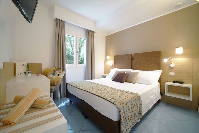 Imagen de la habitación del Hotel Baia del Godano Resort and Spa. Foto 8