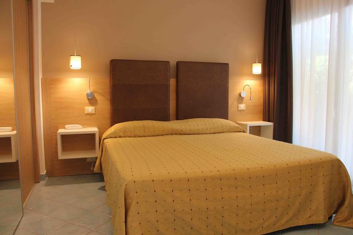 Imagen de la habitación del Hotel Baia del Godano Resort and Spa. Foto 11