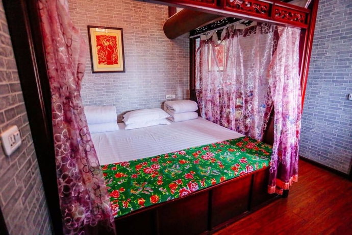 Imagen de la habitación del Hotel Baichanghong Inn. Foto 5