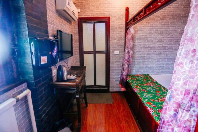 Imagen de la habitación del Hotel Baichanghong Inn. Foto 6