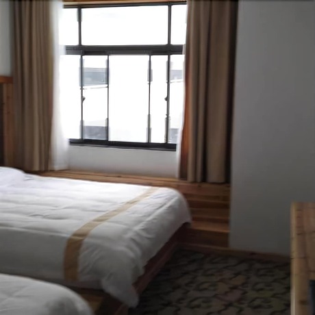 Imagen de la habitación del Hotel Baichuan. Foto 4