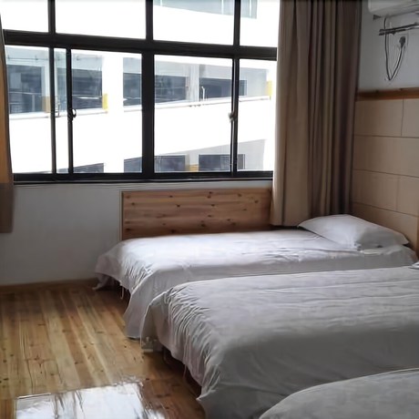 Imagen de la habitación del Hotel Baichuan. Foto 6