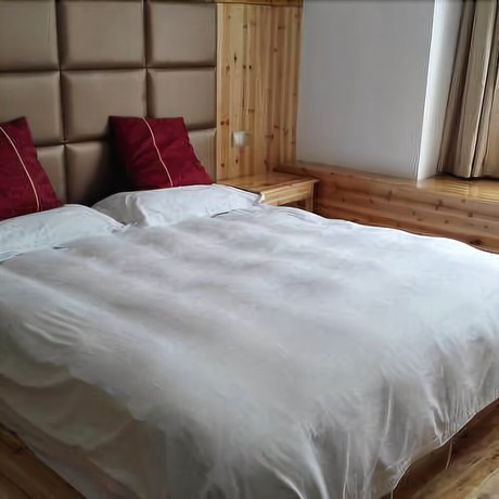 Imagen de la habitación del Hotel Baichuan. Foto 7