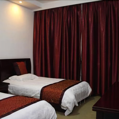 Imagen de la habitación del Hotel Baichuan. Foto 8