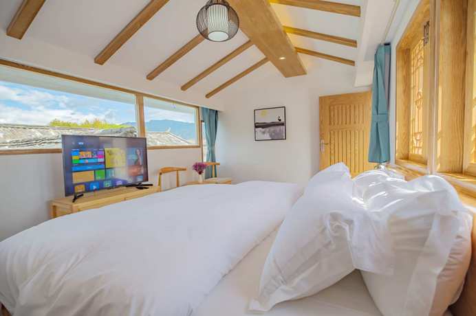 Imagen de la habitación del Hotel Baiduju. Foto 12