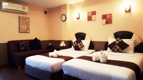 Imagen de la habitación del Hotel Baik Suite. Foto 7