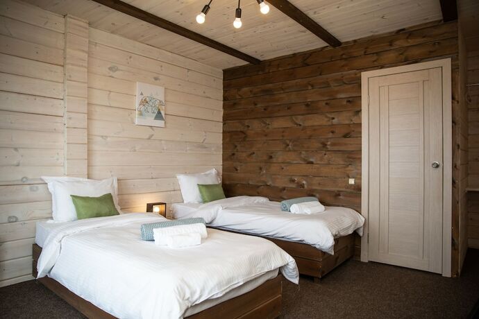 Imagen de la habitación del Hotel Baikalwood Eco Lodge and Spa. Foto 14