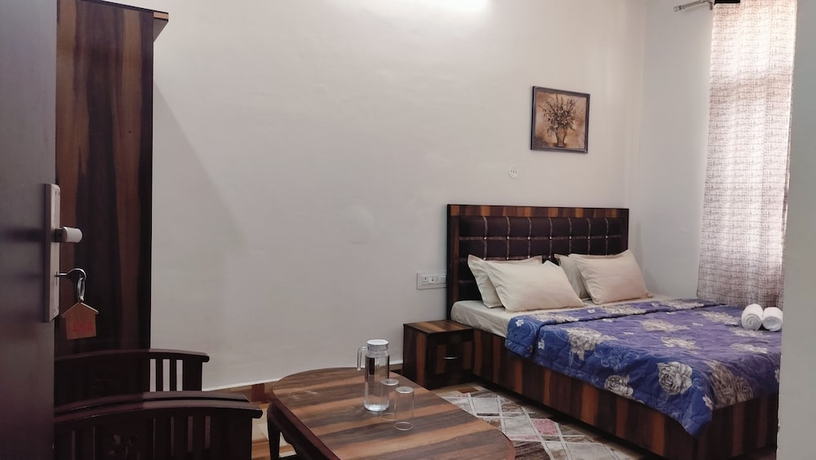 Imagen de la habitación del Hotel Baikunth Home Stays. Foto 3