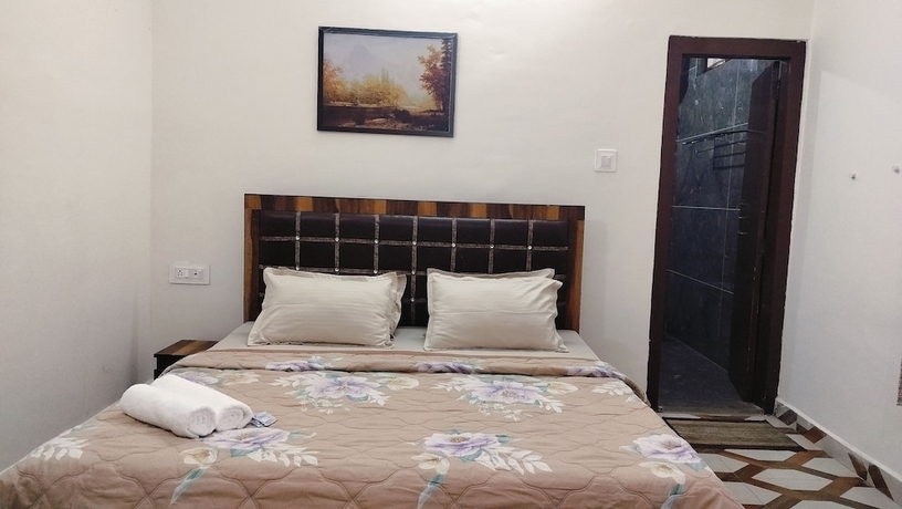 Imagen de la habitación del Hotel Baikunth Home Stays. Foto 7