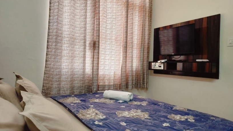 Imagen de la habitación del Hotel Baikunth Home Stays. Foto 8