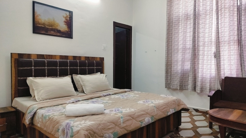 Imagen de la habitación del Hotel Baikunth Home Stays. Foto 10