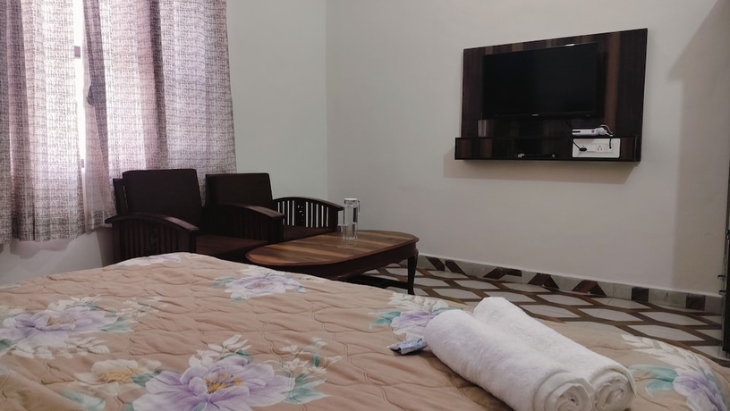 Imagen de la habitación del Hotel Baikunth Home Stays. Foto 11