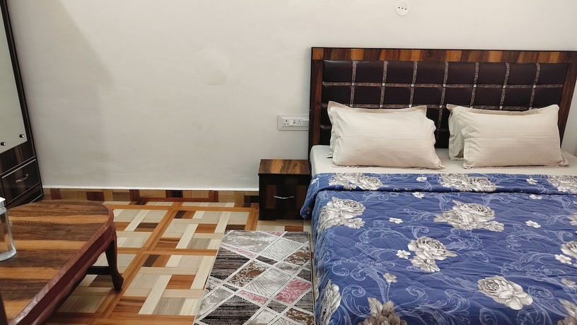 Imagen de la habitación del Hotel Baikunth Home Stays. Foto 12