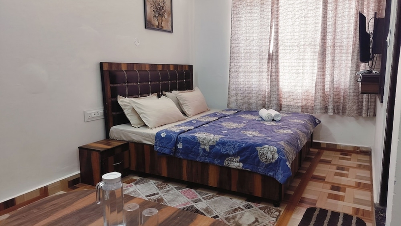 Imagen de la habitación del Hotel Baikunth Home Stays. Foto 13