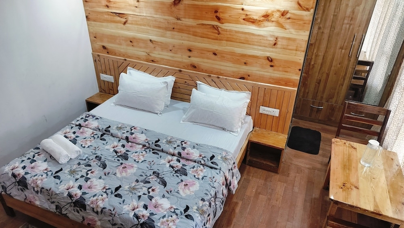 Imagen de la habitación del Hotel Baikunth Home Stays. Foto 16