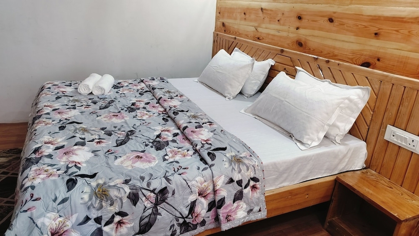 Imagen de la habitación del Hotel Baikunth Home Stays. Foto 17