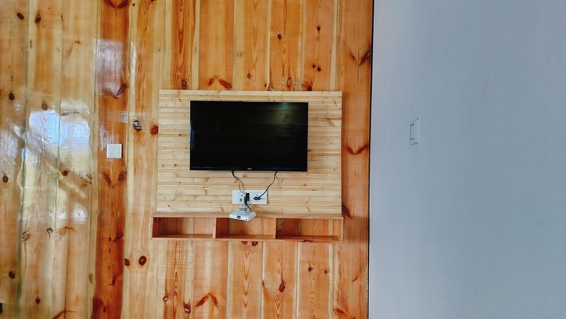 Imagen de la habitación del Hotel Baikunth Home Stays. Foto 18