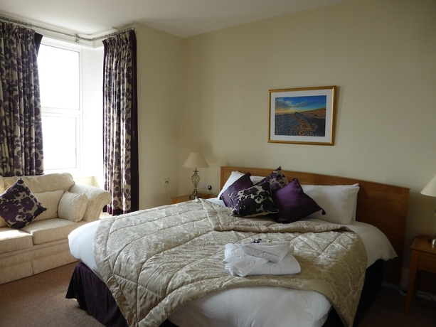Imagen de la habitación del Hotel Bailey Ground Lodge. Foto 6