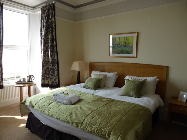 Imagen de la habitación del Hotel Bailey Ground Lodge. Foto 11