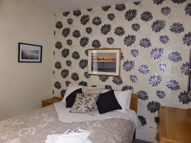 Imagen de la habitación del Hotel Bailey Ground Lodge. Foto 12