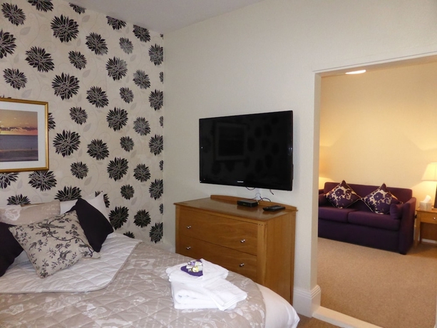 Imagen de la habitación del Hotel Bailey Ground Lodge. Foto 13