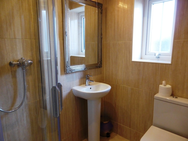 Imagen de la habitación del Hotel Bailey Ground Lodge. Foto 19