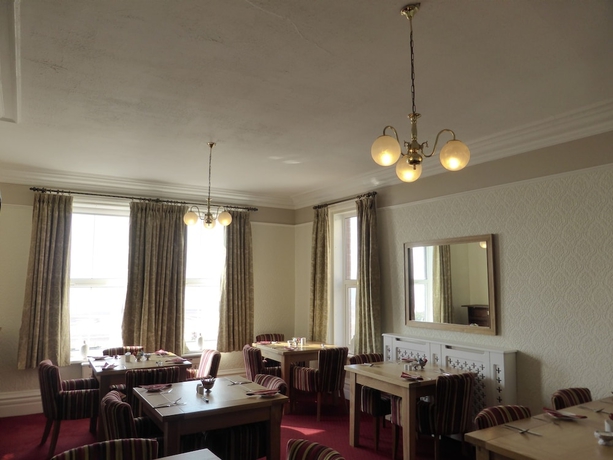 Imagen del bar/restaurante del Hotel Bailey Ground Lodge. Foto 2
