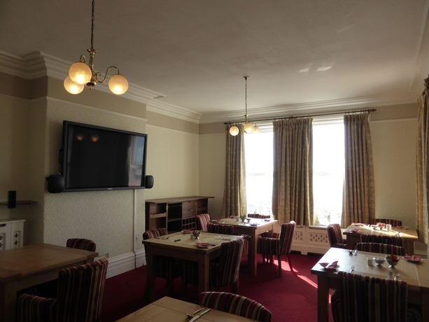 Imagen del bar/restaurante del Hotel Bailey Ground Lodge. Foto 4