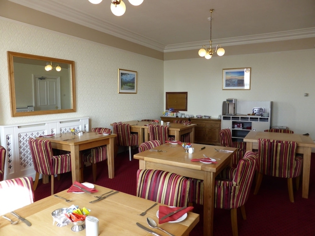 Imagen del bar/restaurante del Hotel Bailey Ground Lodge. Foto 5