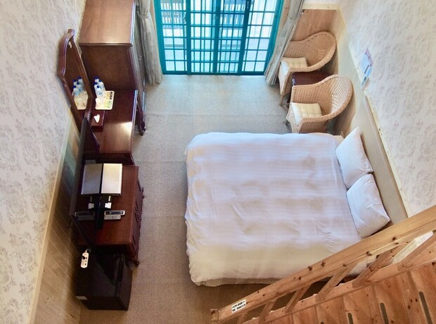 Imagen de la habitación del Hotel Baili Manor Cing Jing. Foto 10