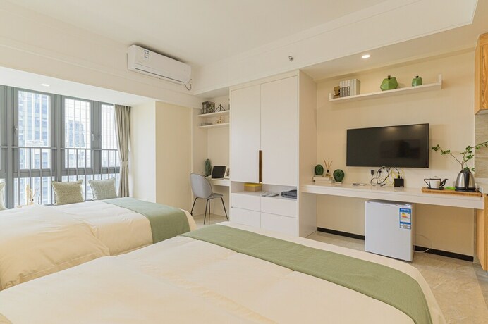 Imagen general del Hotel Bainianhui International Apartment. Foto 13
