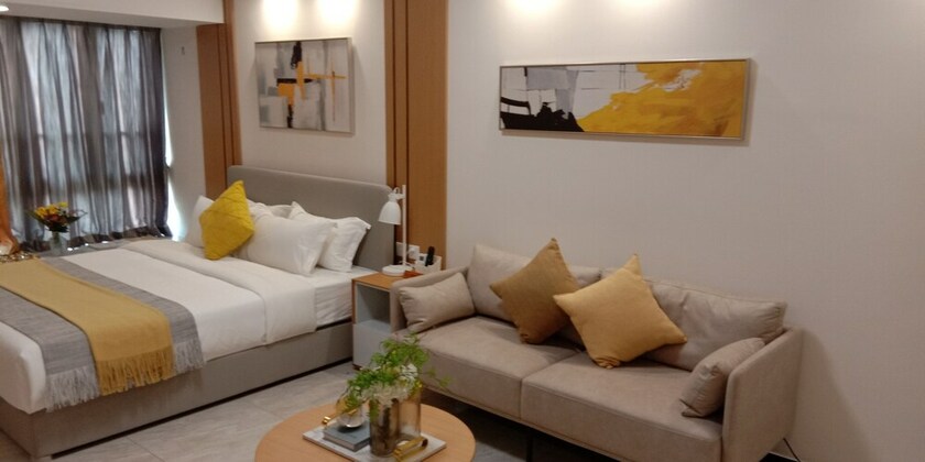 Imagen de la habitación del Hotel Bainianhui International Apartment. Foto 31