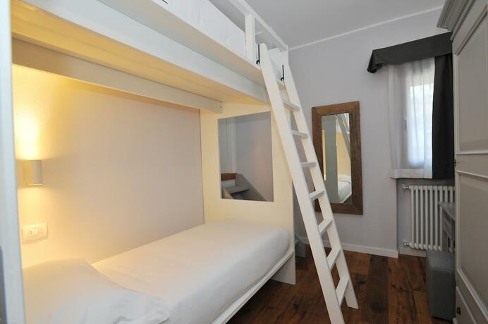 Imagen de la habitación del Hotel Baita Fanti Ski and Bike. Foto 16