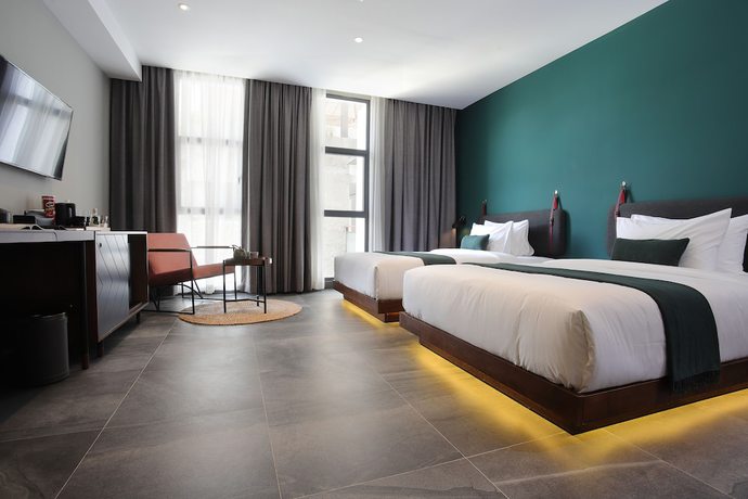 Imagen de la habitación del Hotel Baitong and Resort. Foto 11