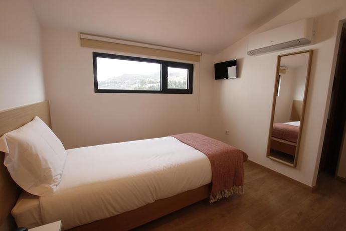 Imagen de la habitación del Hotel Baixa. Foto 7