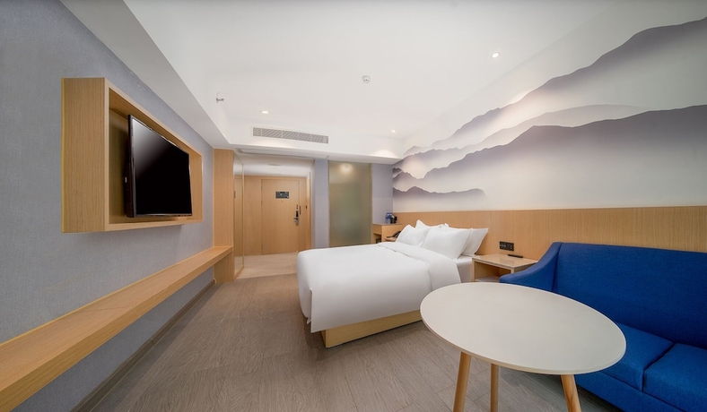 Imagen de la habitación del Hotel Baiyun Airport Cocoa. Foto 10